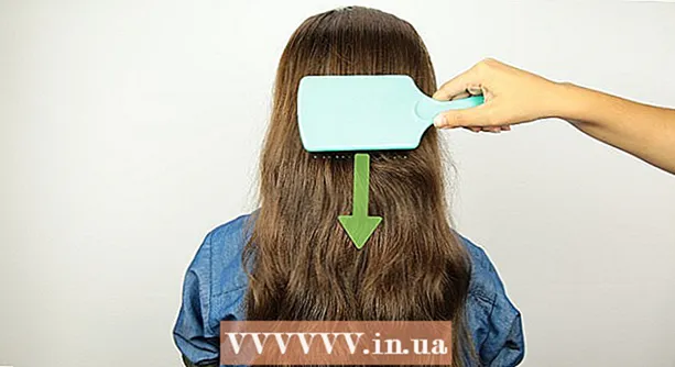 Πώς να σηκώσετε τα μαλλιά σας με ένα κλιπ καβουριών