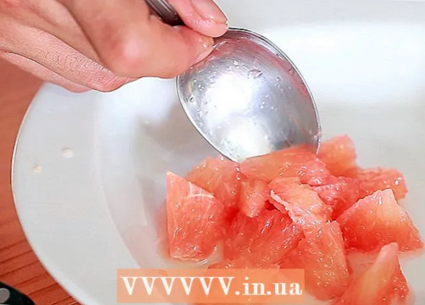Cara memotong jeruk bali menjadi irisan