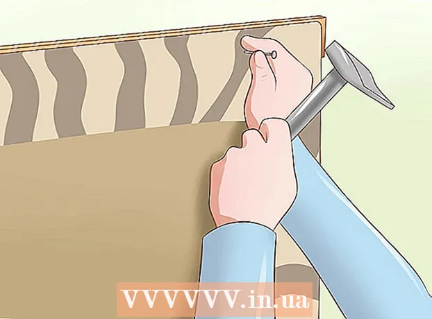 敷物を壁に掛ける方法