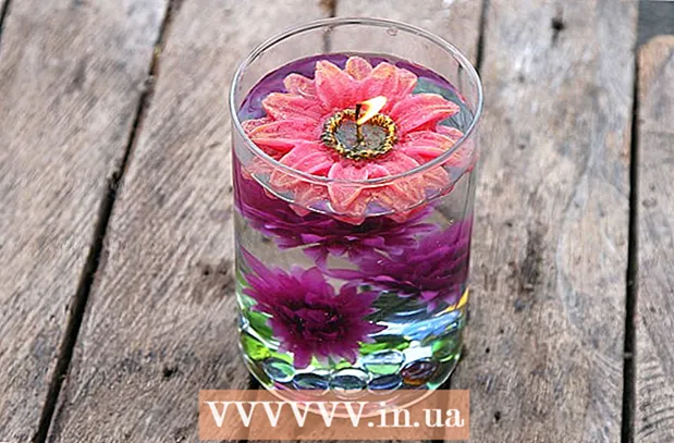 Kako narediti kompozicijo za dekoracijo mize iz umetnega cvetja in vode