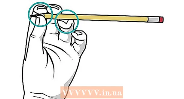 Cum să rotiți un creion în jurul degetului mijlociu