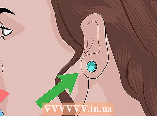 วิธีการใส่ตุ้มหูในการเจาะหูที่รกไปบางส่วน